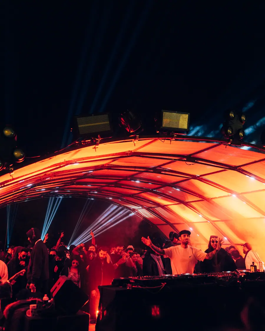 The arch stage in full colour with the crowd below