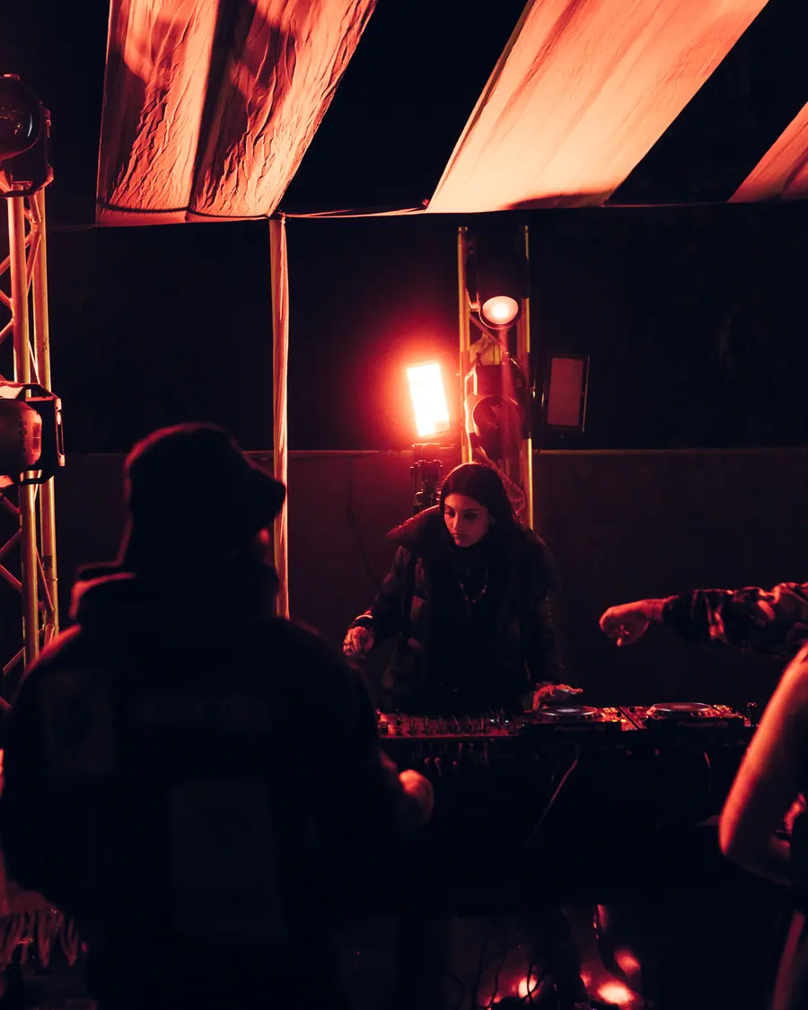 Amber light across the booth and rig